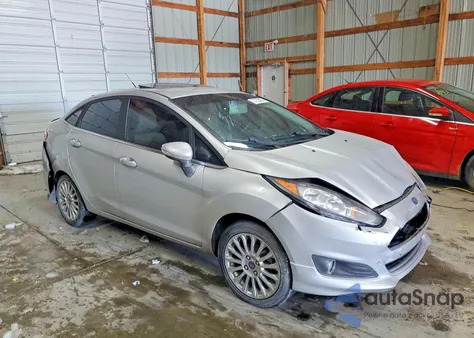 2014 Ford Fiesta Titanium z USA, uszkodzony, nr VIN 3FADP4CJXEM107270